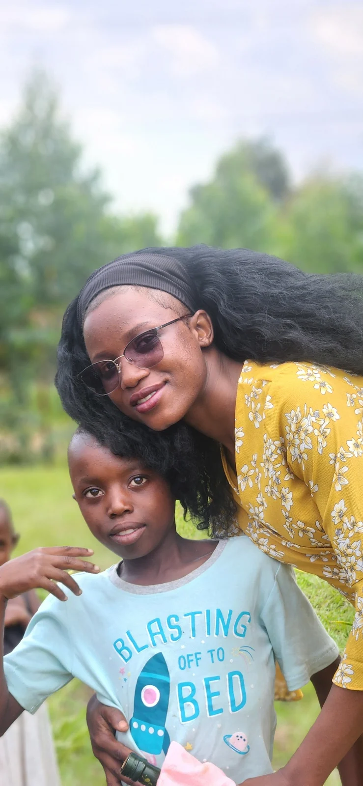 A child-centred field moment supporting care and confidence.