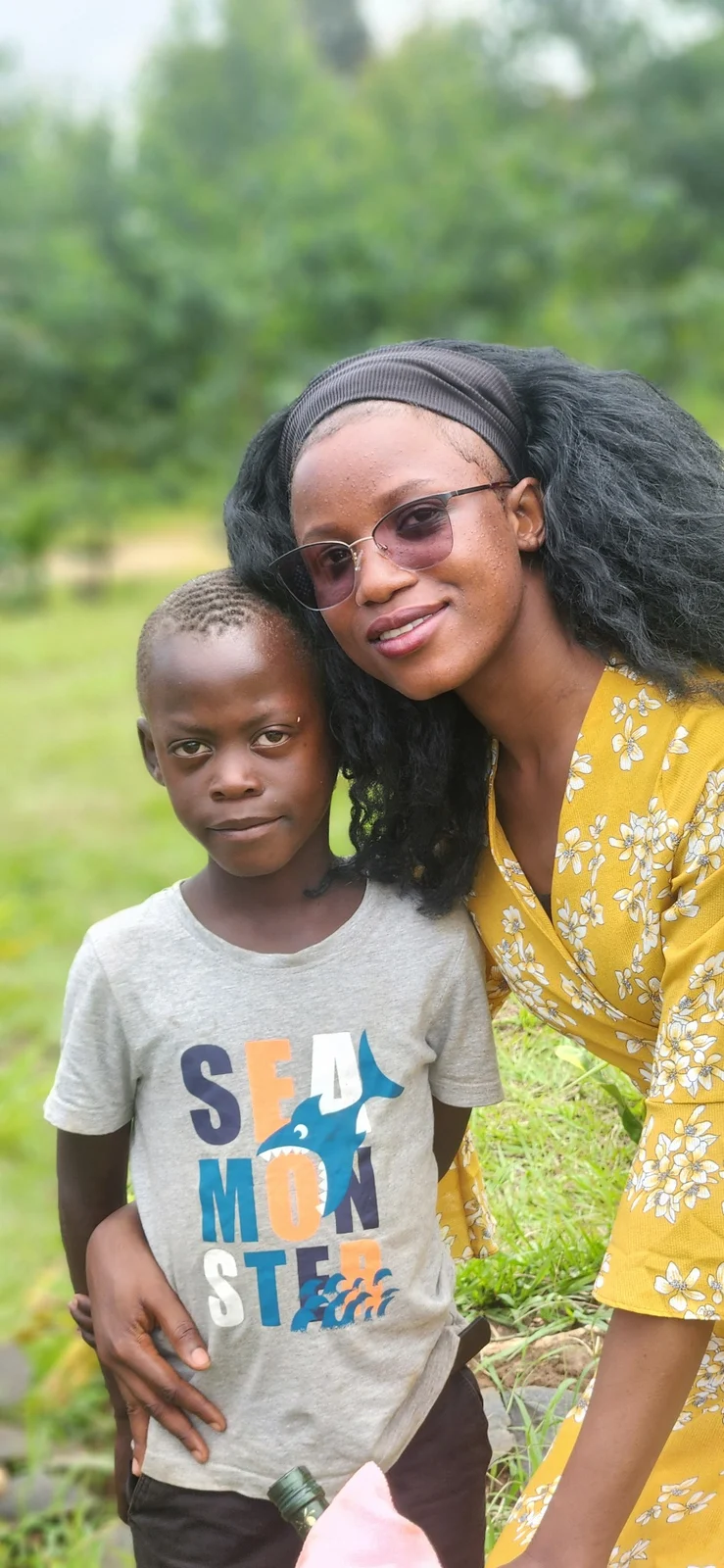 A KRF encouragement moment with a child in the community.