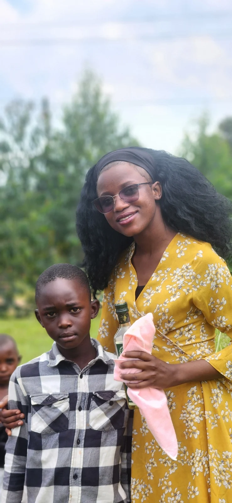 A KRF team member sharing a calm mentoring moment with a child.