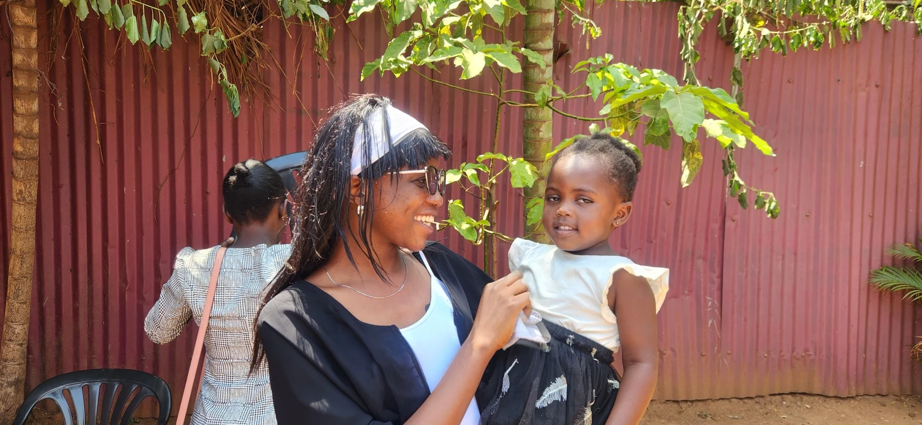 A warm family-centred moment with a young child.