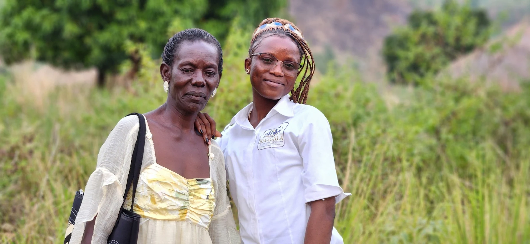 A dignified portrait moment during community engagement with women.