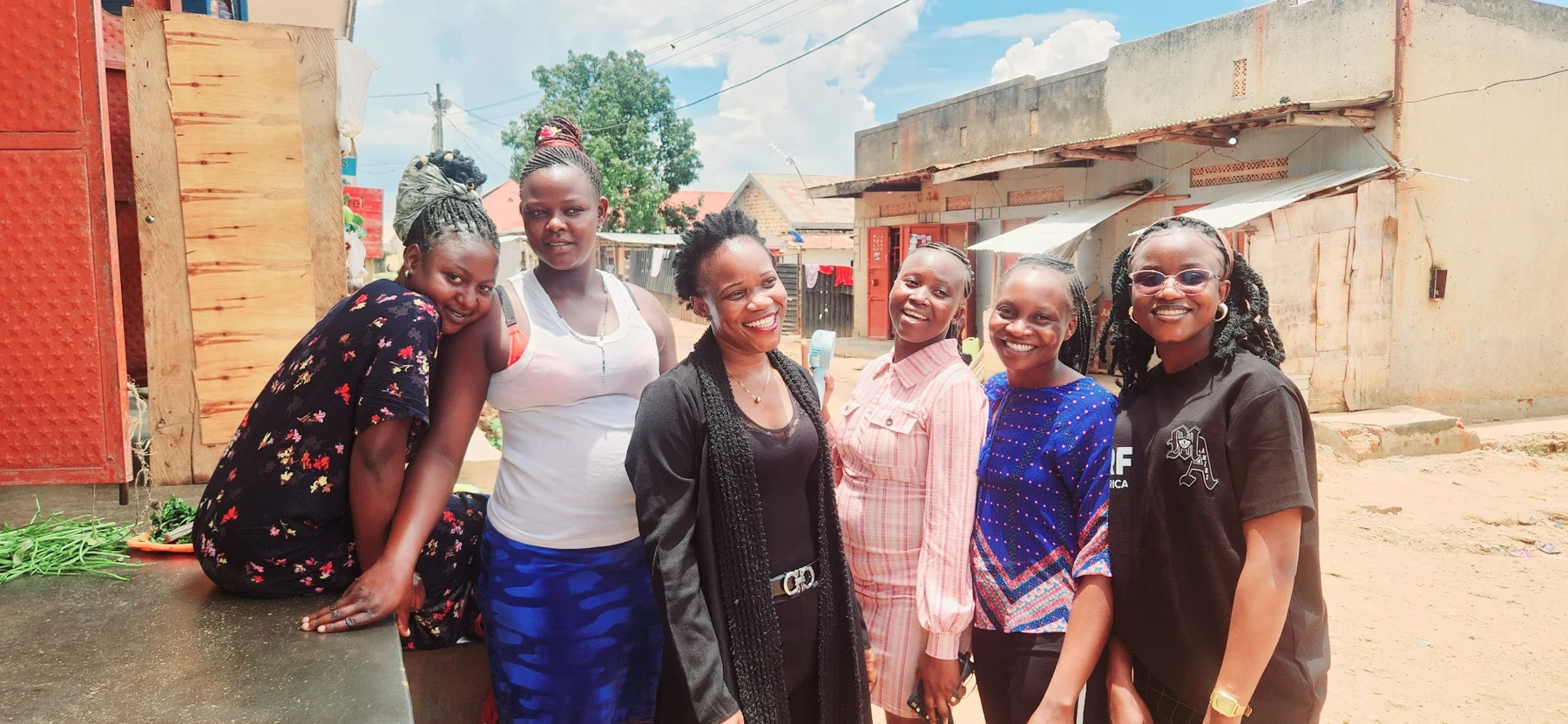 Women photographed together during community engagement.